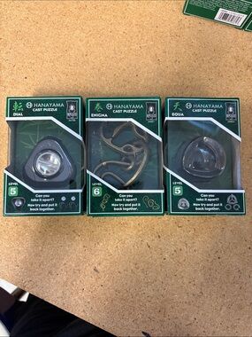 Hanayama Cast Puzzles set of 3 Enigma Dial Equa